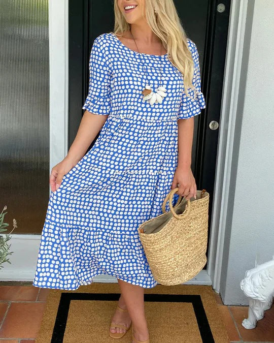 Jessika | Elegant midiklänning med lekfulla volangdetaljer